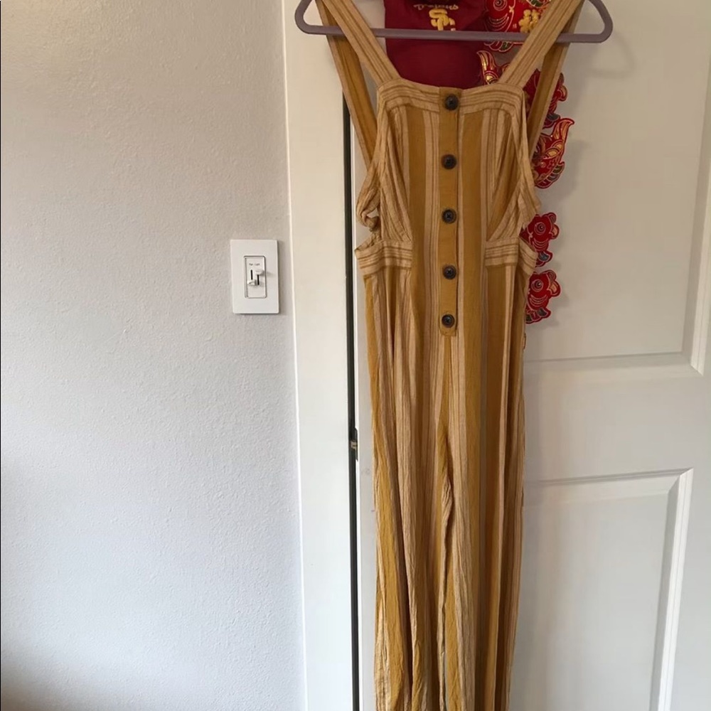 yellow strip jump suit- never worn